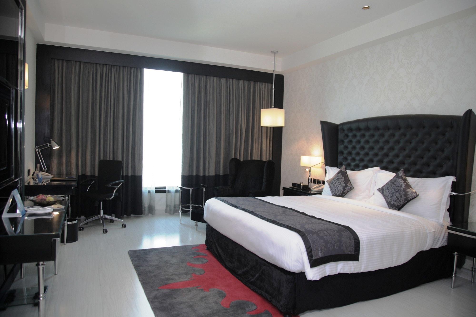 Radisson Blu Hotel New Delhi Paschim Vihar Exterior foto A room at the hotel