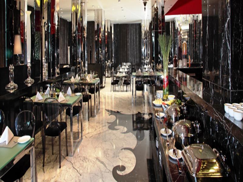 Radisson Blu Hotel New Delhi Paschim Vihar Exterior foto The restaurant